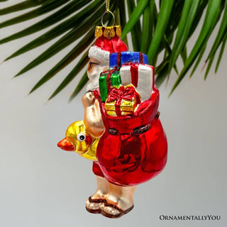 Santa on Summer Vacation Glass Ornament