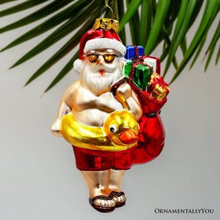 Santa on Summer Vacation Glass Ornament